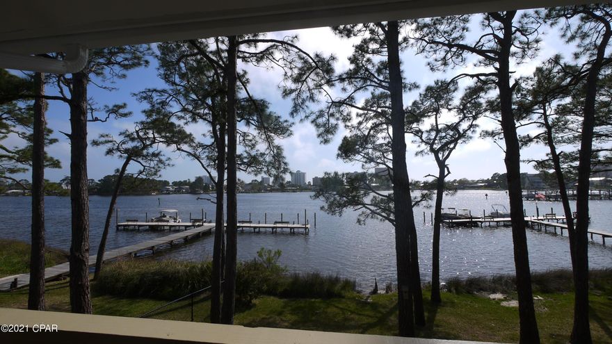 Available January 2022 - Enjoy amazing views from this 2nd floor corner unit -1 bedroom 1 bath Waterfront Condo on Grand Lagoon.  Rent includes water/sewer/trash/cable - Tenant pays electric, internet. Complex offers community pool, tennis court, and a dock on the Lagoon. No pets allowed. This unit is unfurnished.