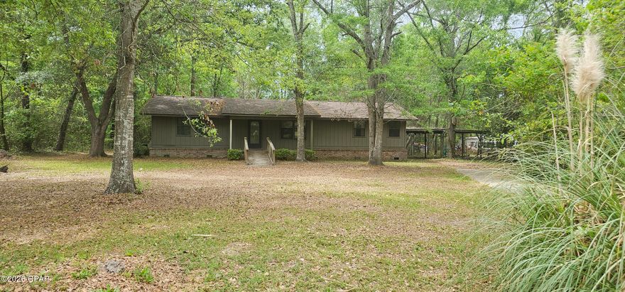 What Possibilities can be done to this Brick 3 Bedroom 2 Bath home located in Blountstown Florida. Nestles under several beautiful shaded trees sit this 1,475 sq ft home. Relax on the back deck overlooking the spacious backyard and watch the kids play. The home has a split bedroom plan and a separate laundry room. Outside there is a 2 car detached carport. With some vision this home can make the perfect home for you or as an investment property. Easy access to Blountstown High School and all major roads and located just an hour away from Mexico Beach/Port St Joe and The Worlds Most Beautiful Beaches. Call today for your personal showing.