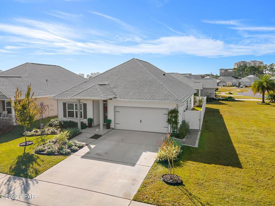 'CURRENTLY UNDER CONTRACT, SELLER WILL CONSIDER BACKUP OFFERS' Beautiful 4 Bedroom 2 bath home located in the heart of Panama City Beach. The living room and master bedroom feature trayed ceilings and ceiling fans. The master bedroom boasts a large walk-in closet, a large walk-in shower and a separate garden tub. While the house is designed for 4 bedrooms, one can be easily reconfigured to serve as an office. 

Standout features in the kitchen include granite countertops, a large matching island, natural stone look backsplash and a huge walk-in pantry. All appliances including Range, microwave, dishwasher, and French door refrigerator/freezer are stainless steel. 

The fenced manicured backyard will impress with not only the large variety of plants (Hibisc also a view of the neighborhood pond and its spraying fountain. 
Less than 1/4 mi from this house is Shipwreck Island one of the most famous water parks in Florida. The house is literally 1/2 mile from the World's Most Beautiful beaches in one direction and shopping and restaurants in every direction. Perhaps the best location in all of Panama City Beach.
There are so many things the sellers love about this home, but probably the thing they love most is its location. It is literally in the heart of Panama City Beach. CONVENIENT TO EVERYTHING. It is one city block from the beach, 1/2 mi from Lowes, HomeDepot, Publix and dozens of restaurants. The very popular Pier Park is less than 4 miles away. 
Perhaps the thing they like second most is where the house is situated within the neighborhood. It's near the entrance and close to the community pool and mailboxes providing easy entrance and egress. 
Finally, and maybe the most important are the neighbors. All are extremely friendly and are quick to assist when help is needed. It's a great place to​​‌​​​​‌​‌​​​​‌​​‌​​​​‌‌ live.