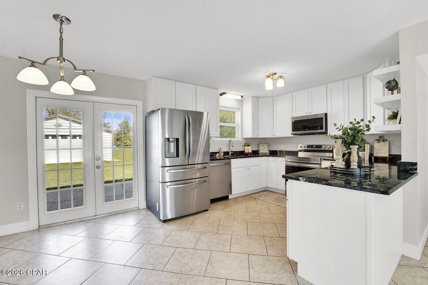 Move-in ready, fully renovated, and sitting on nearly half an acre -- this all-brick ranch offers space, updates, and flexibility that are hard to find. Even better, the home has not been occupied since the renovation was completed.

Inside, you'll find a bright interior with fresh paint and updated finishes throughout. The beautifully renovated kitchen is the center of the home and features custom cabinetry, granite countertops, and brand-new stainless steel appliances, creating a stylish and functional space for everyday living and entertaining.

A spacious bonus room with its own half bath expands the heated and cooled living space, making it perfect for a second living area, home office, game room, or guest space.

Outside, the property offers plenty of yard space and a detached two-car garage/workshop, ideal for storing tools, outdoor equipment, or all the toys.

Major updates provide peace of mind, including a new roof, new windows, new HVAC system, new water heater, updated flooring in the bonus room, and new French doors. With so many improvements already completed, the home offers the comfort of modern upgrades paired with the durability of classic all-brick construction.

Conveniently located just 10 minutes from the new Publix on Hwy 231! Renovated homes with land, a workshop, and bonus living space are hard to find -- schedule your showing today.