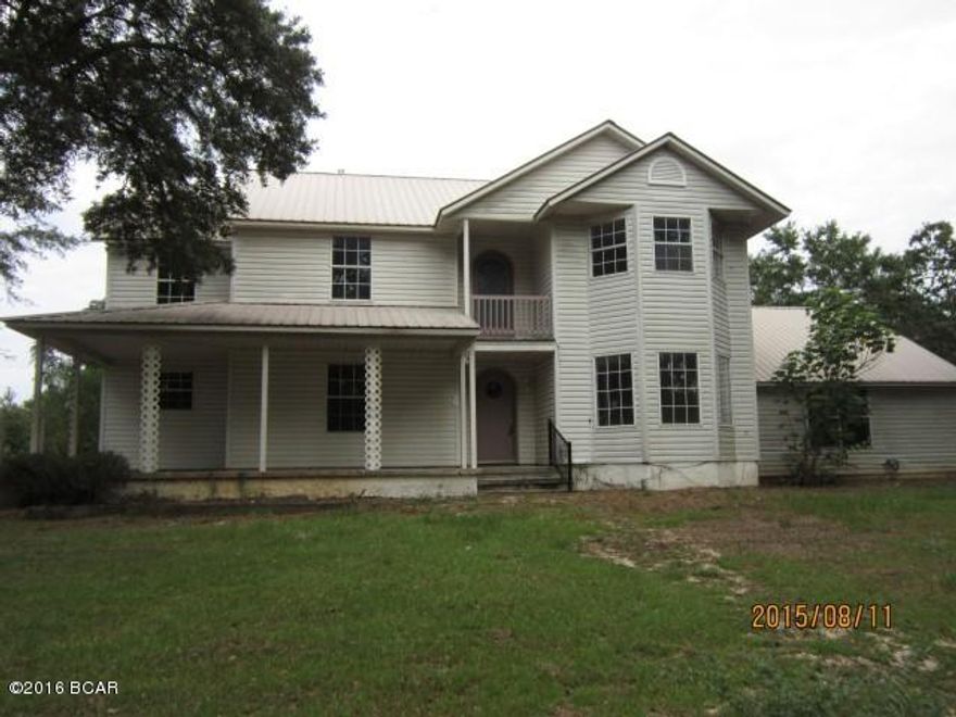 30 acres, Kynesville community, 3032 square ft. 2 story vinyl house with in-ground pool, large barn with loft apartment. House features large living-dining combination with laminate floors, on first floor, with sliding glass doors overlooking the in ground pool. Large kitchen with new stove and dishwasher. There is 1/2 bath off the kitchen, and large laundry room. Downstairs bedroom with ceramic tile floors and private bath. The upstairs opens in a large sitting area with additional bedroom off of this room and also features a private bath. Across the sitting room is the master bedroom, with a second sitting room. The master bath has a Jacuzzi tub with separate shower. A small balcony opens from the main sitting room. Out back is large barn with a 2/1 loft apartment and outside stairway. This apartment is rundown and will need work.  Property consists of some open pasture land and some wooded, rolling, with pine trees. About half the property is wooded.  House has had some renovations including new paint, new stove and new dishwasher, various repairs including a new walk in garage door, exterior repairs of siding and pool storage room.  This property sold for $360000 and $410000 the last two Arms length transactions.    HOMESTEPS FINANCING IS AVAILABLE.  PRESENTLY UNDER AUCTION TERMS.  SEE XOME AUCTIONS FOR FURTHER DETAILS.