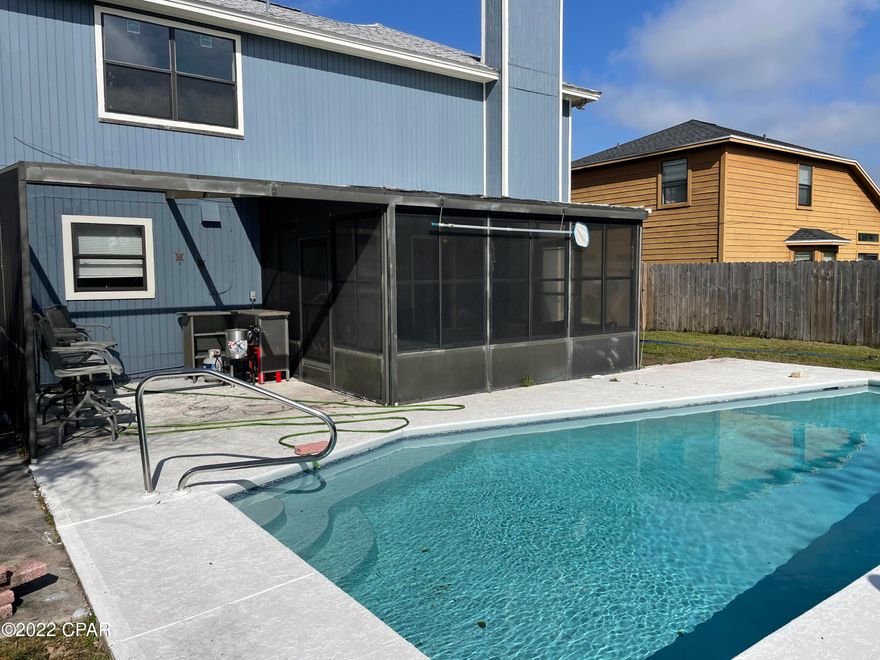 Amazing 3-bedroom, 2.5 bath home with pool! Home has an excellent location in Lynn Haven near schools, shopping, and dining. Features include LVP flooring in the living room & bedrooms, recently replaced roof, fencing, stainless steel appliances, and two car garage.  In-ground pool has been re-plastered and is well-maintained. Main bedroom includes double-vanity and large walk-in shower. Home also includes two additional bedrooms and full bath as well as a half bath on the first floor.  No HOA fees! All info is not guaranteed and must be verified by Buyers if important.  Welcome Home!