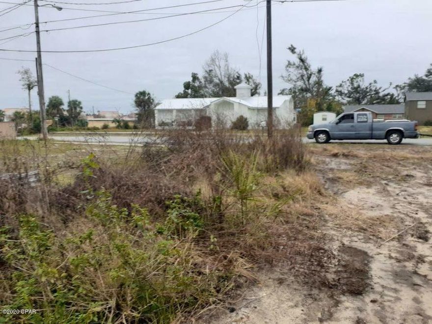 Vancant lot with access to city water, sewer, and electric.