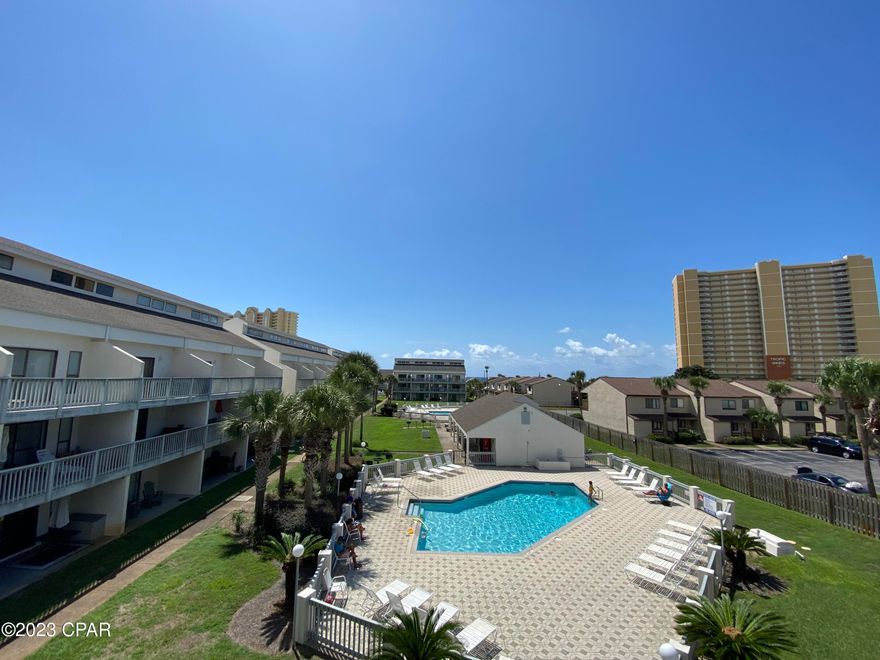 Absolutely immaculate and fully renovated top-floor condo in the highly desirable Endless Summer community--just steps from Beach Access 70! This fully furnished 2-bedroom, 2-bathroom unit is move-in and rental ready, offering a stunning pool view from the oversized balcony and even a peek at the Gulf of Mexico. Recent upgrades include a brand-new HVAC system, luxury vinyl plank flooring, updated guest bathroom, granite countertops, new washer/dryer, and more.

Thoughtfully furnished with a queen bed in each bedroom and a queen sleeper sofa, this condo comfortably accommodates guests and makes an ideal vacation home or income property. Endless Summer offers fantastic amenities including two swimming pools, a hot tub, and a clubhouse, all in a prime location just 1/2 mile past Highway 79 and Pier Park.

Don't miss this opportunity to own your own slice of paradise!