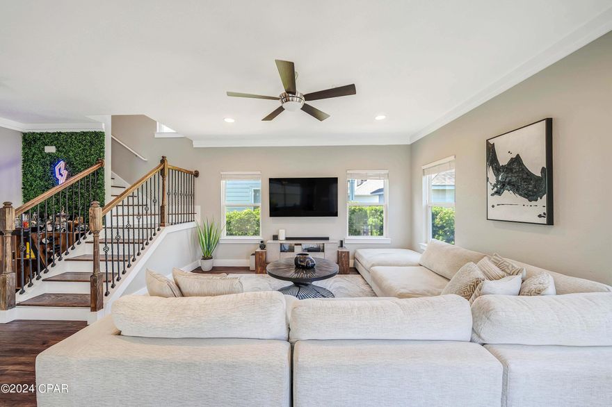 This home is filled with numerous impressive updates that are sure to catch your eye! With a thoughtfully designed floor plan, you'll find two master suites - one on each floor, providing convenience and flexibility. The lower level embraces an open concept layout, creating a welcoming space that's perfect for entertaining friends and family. The kitchen is a highlight, featuring stylish granite countertops, stainless steel appliances, and a generously sized breakfast bar. As you ascend to the upper level, you'll discover the second floor master bedroom, which comes with its own private balcony. Additional perks of this home include a detached 2-car garage, ensuring ample parking and storage space. The community of Magnolia Bay Club offers an array of fantastic amenities, including inviting community pool, community dock with kayak launch/racks, two small children playgrounds, the added security of a gated entrance, fitness center, trash service and lawn care all included with HOA fees!