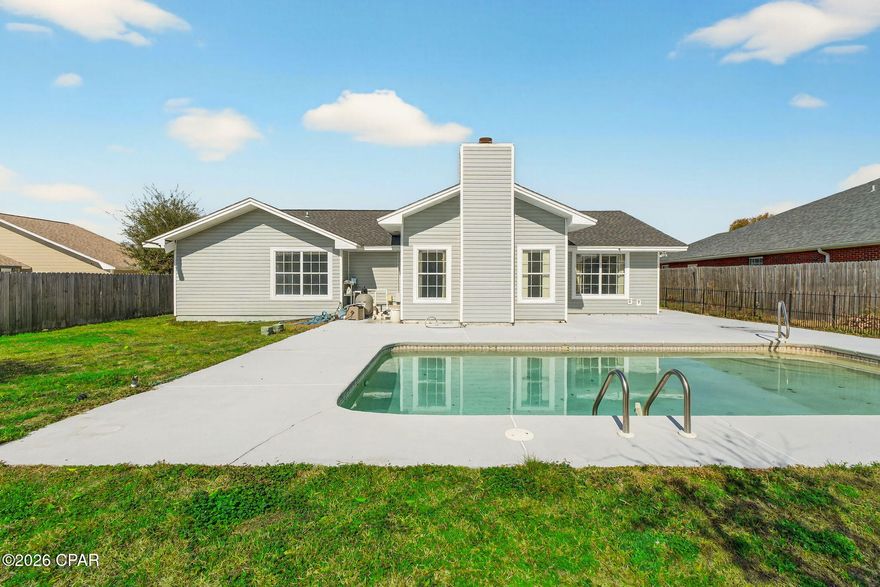 Priced to sell...this 3-bedroom, 2-bath home with an inground pool offers great curb appeal and a functional layout. Conveniently located in Callaway near Tyndall Air Force Base, shopping, restaurants, and grocery stores, the location makes daily living easy.

The privacy-fenced backyard features multiple fruit trees and an inground gunite pool--perfect for enjoying warm summer days. Inside, the living room includes a wood-burning fireplace and a built-in bar with sink, opening to a spacious dining area that provides a great setup for entertaining.

Recent improvements over the past few years include new plumbing from the street to the home, a new water heater, garage door, and roof. The dishwasher is brand new and never used. The home is currently protected by a Termite Bond and is transferable to the new buyer.