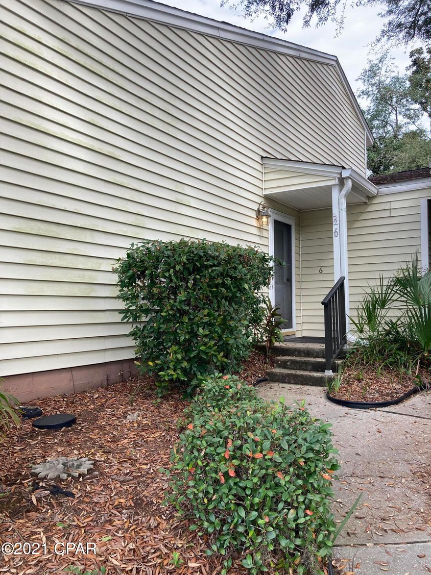 MOVE IN READY!  Fabulous low maintenance townhome a block from Beach Drive.  This light filled two bedroom, 2.5 bath home offers an open plan living.  The primary bedroom on-suite features a charming window seat and is on the main floor.  The kitchen is well equipped and offers tons of storage.  The living area features a vaulted ceiling with skylights.  It opens onto an open patio and private common area with pretty trees and flowers. Upstairs is another bedroom and private bath.  Townhomes in Bakers Court rarely come on the market - schedule your showing today and see what makes this home a real standout!