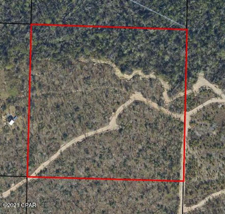 NO RECORDED ACCESS to property. Property is landlocked. The ''road'' going into the property is only a trail and crosses the neighbor's land. Edith Hite stops before the property begins. It will be buyer's responsibility to verify access after purchase. Cash purchase only. 10 acre parcel located just outside of the Fountain city limits. Wooded with lots of wildlife. According to an old farm inspection report the swiftly-flowing Juniper Creek runs through the north end of the property leaving about 7 tillable acres. Perfect for hunting or a weekend retreat away from it all. Serious inquiries only willing to accept property with no access.