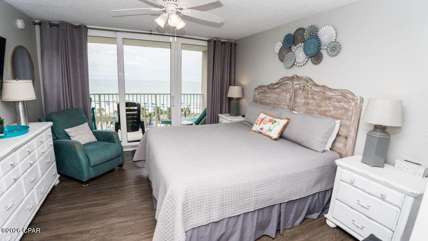 Welcome to Dunes of Panama B505, a beautifully remodeled and updated top-floor Gulf-front condo in the highly desirable low-density ''B'' building with only 40 total units. This stunning 2 bedroom, 2 bath residence includes a deeded parking space and an indoor climate-controlled storage unit, offering exceptional convenience and value. Enjoy breathtaking Gulf views from the living room, dining area, kitchen, and master suite, with panoramic vistas that truly do not get any better. The interior features a remodeled kitchen, beautifully tiled bathroom showers, and wood grain luxury vinyl plank flooring throughout, creating a clean, coastal, and move-in-ready feel. Offered fully furnished, this condo is ideal as a second home or rental investment property that is sure to please. Located directly on the sugar white sands, Dunes of Panama offers 1,500 linear feet of beachfront along with three Gulf-front pools (one heated), tennis courts, basketball, fitness room, volleyball, shuffleboard, outdoor BBQ grills, free Wi-Fi, Stingray's restaurant and gift shop, and the popular Sneaky Tiki poolside bar. Relax, unwind, and enjoy resort-style living with strong rental potential in one of Panama City Beach's most established beachfront communities.