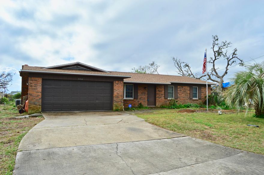 NEW ROOF! Minutes from Tyndall Air Force Base!  3 bed Room 2 Bath Home for under 200k with all Hurricane Damages Repaired! Sellers just replaced roof January 2019. This home features a Brick Fireplace, Spacious Backyard,  wired ready to go with an alarm system, back patio with pergola, and much more. This home is a must see!