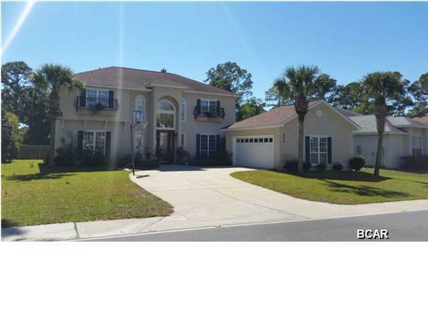 Awesome home, for a growing family, or if you just need space. Present owners had home built 2003 by ''Tom Gladstone''. A contemporary home with modern architecture,transom windows over French doors. This home has at least one window in every room of the house. If you are that person that loves to see the light come in, this one is for you.(Light & bright & airy )Enter thru the front door on wood floors & step into the awesome Living room, with 23 foot ceilings. Display arches that are lit & wired. Built in cabinets & drawers both side of the gas fireplace. There is screened in porch that has access from the LR. The kitchen has lots of space, corian counter tops, eat in breakfast bar & a breakfast nook, with windows all the way around. The pantry is convienent & walk in. A desk area for your computer is between kitchen & laundry room. Laundry has full size washer & dryer that stay with the home, along with sink, cabinets & hanging space. Also downstairs you have a bedroom & full bath.(Being used now as an office.) 3 bedrooms upstairs, including a balcony out from the master bedroom. 2+ garage with pull down stairs & flooring for attice storage. Also extra storage under the stairwell.New AC put in April 2015(Sg. ft. under roof is 3117, please measure if concerned)
