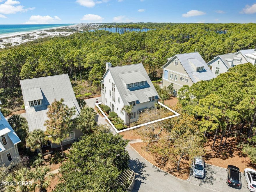 LOCATION, LOCATION, LOCATION - SOUTH OF 30A IN WATERCOLOR: Positioned along WaterColor's exclusive Park Row and bordering the serenity of Grayton Beach State Park, this gulf-front home delivers the rare combination of privacy, space and immediate access to the best of 30A. With sweeping views of both the gulf and Western Lake, this six-bedroom retreat is just steps from the Beach Club, Fish Out of Water and Town Center—yet tucked away enough to offer the quietude expected from a high-end coastal escape.

Designed with both elegance and ease in mind, the home unfolds across three thoughtfully planned levels. The open-concept main living area on the second floor features soaring ceilings, a custom Tabby fireplace and an expansive porch perfectly positioned to catch the gulf breeze and glowing sunsets. A chef's kitchen with Sub-Zero and Wolf appliances, premium finishes and seating for eleven offers the perfect backdrop for entertaining family or unwinding after a day on the sand.

Two luxurious primary suites — one on the second floor and a more expansive one on the third — each feature private porches, spa-inspired baths and direct gulf views. Four additional guest rooms provide ample space for large families or groups, with flexible sleeping arrangements, including bunks, twins and trundles. Additionally, the home  includes a sand room for rinsing off after the beach and a two-car garage. 

Outdoor living is equally considered, with large porches, gulf-facing balconies and a peaceful setting that backs up to preserved green space. Whether you're enjoying a sunset cocktail, walking to the Wine Bar or starting your day with a paddle on Western Lake, the home invites you to experience WaterColor at its most effortless and elevated.

With access to world-class amenities — from the gulf-front pools of the Beach Club to Camp WaterColor, the BoatHouse, tennis center and miles of nature trails—this Park Row address is more than a beach house. It's a front-row seat to the very best of coastal life.