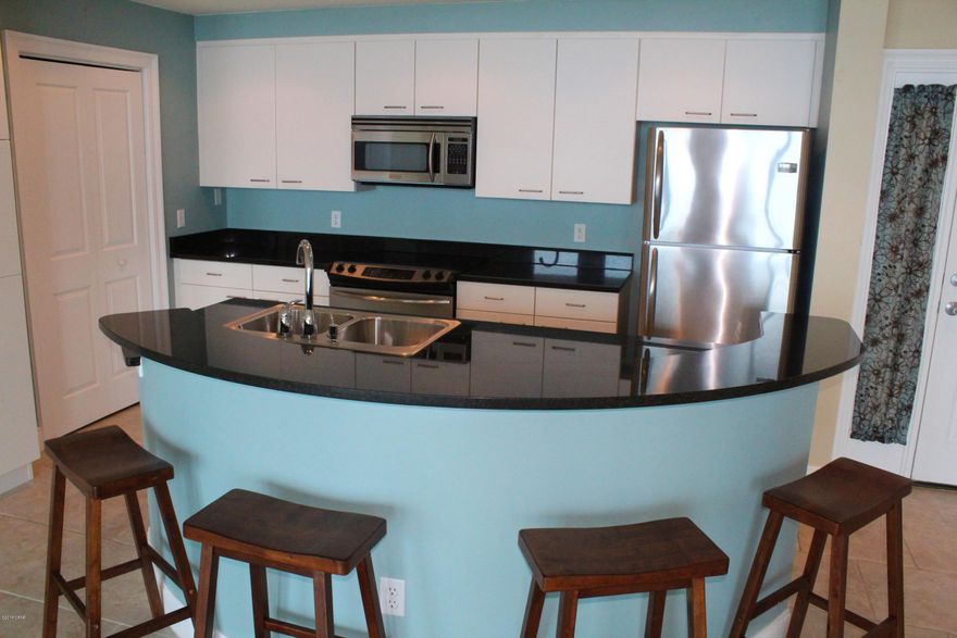 Bay Waterfront Spectacular 7th floor Condo with unbelievable breath taking views. Bay Views from kitchen/dining room/living room/and both bedrooms.  Kitchen with lots of cabinetry includes granite counter tops, breakfast bar, stainless steel appliances, and a cabinet pantry. Sliding doors in both bedrooms and living room/dining room combination area.  Master Bedroom Suite with walk-in closet, luxury master bath with separate shower and extra deep soaking tub great for those bubble baths.  2nd Bedroom also with walk-in closet.  Come sit outside on the nicely sized patio with grill great for family get togethers.  Come see for yourself!!  Adjacent Marina offers boat slips for rent/for sale not owned by Marina Landing or condo owner.