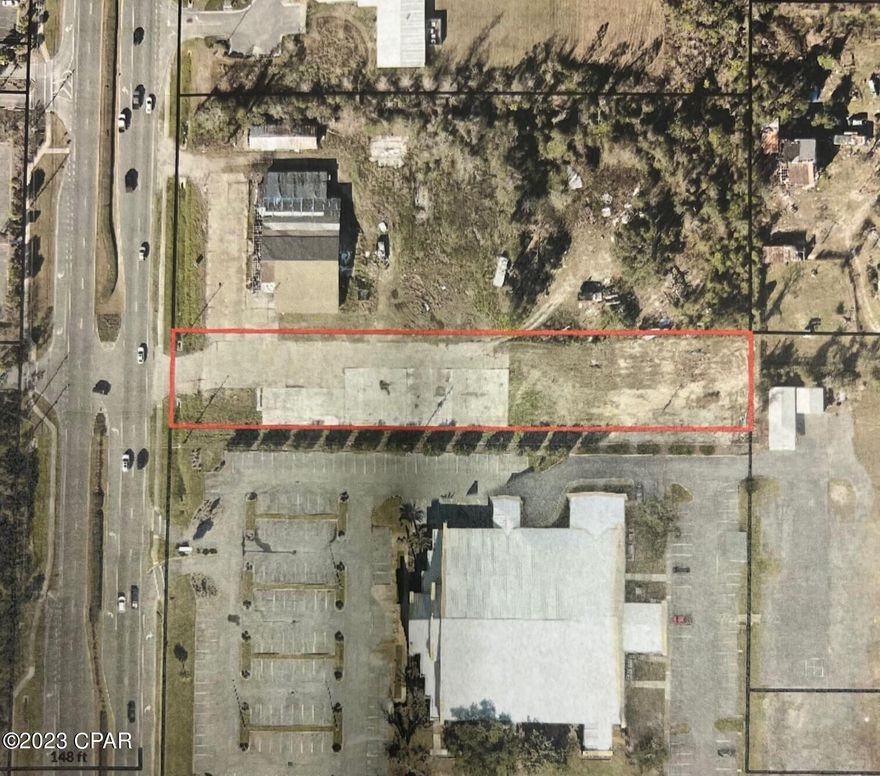 COMMERCIAL LOT ON HWY 77. LOT MEASURES 95.3' X 550.19'. SOME EXISTING CONCRETE SLAB AND PARKING REMAINS FROM BUILDING THAT WAS DESTROYED BY HURRCANE MICHAEL AND DEMOLISHED.