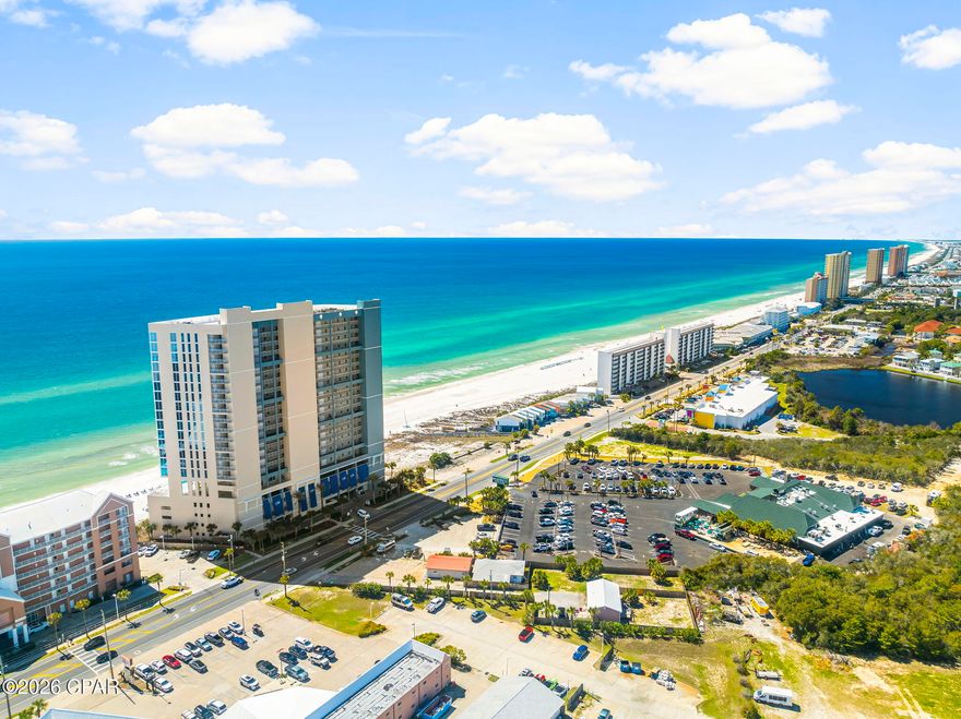 Step into Palazzo Unit 806 to enjoy one of the best values on the beach.  This 2 bed/2 bath condo ALSO has a bunk room AND an additional storage unit... perfect for all of your personal beach gear.  Comfortably sleeping 8 and outfitted in classic beach style, this condo is perfect for your family vacation or as a short-term rental.  Your kitchen is outfitted in all stainless steel appliances and granite counters.  The Master Suite and Living Area both open onto your spacious balcony.  The Palazzo, built in 2008, offers resort style amenities including a state-of-the-art fitness center, under building parking, heated pool, hot tub, grilling and picnic areas, coded garage access with on-site building security, and owner pet walking area.  Major building updates completed within the past 4 years include—with no special assessments—full exterior painting, new deck with beach access, pool and lobby area retiling, balcony resurfacing, and parking garage fire suppression replacement.  The 2026 HOA fees have not risen in 3 years.