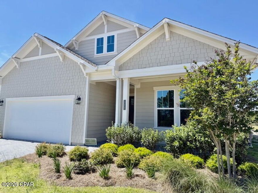 NEW HOME with WATER VIEW!!  LAWN CARE, PEST CONTROL AND TRASH. PICK UP INCLUDED!  Modern elegance welcomes you as you enter this 3 bedroom, 3 bath home with beautiful water view from the living/dining, kitchen and master bedroom area.   Special features include an oversized 2 car garage, a flex-space study, 10ft ceilings,  a plethora of windows that  bathe the home in natural light, and oversize tray ceilings that add to the elevated atmosphere. The gourmet kitchen is the heart of the home, boasting designer-selected finishes such as an expansive island, quartz countertops and GE Profile appliances. The massive 22' x 18' covered lanai overlooks the large community pond offering relaxing views and exceptional privacy.  This highly sought after location is within minutes to a vibrant array of shopping and dining, the airport, and beach access.  You will also be in the heart of exciting new developments including    the 87-acre TMH/FSU Hospital, the upcoming West Bay Shopping Center with 50,000+ sq. ft. of retail space, and a Publix, expected to open in Spring 2026. Whether you're looking for elegance in a peaceful surrounding or an unbeatable location, this one delivers it all.  Call today for your tour.