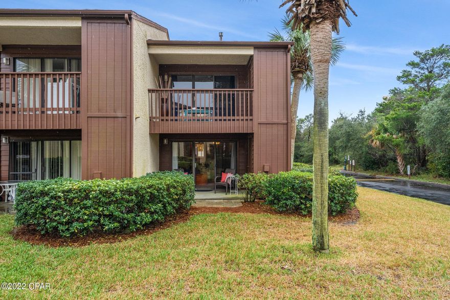 Condo 15F is just a short walk to the beach and just a few miles to Pier Park! This end unit has a spacious  living and dining area on the ground floor with a walk out patio and lawn.  There is also a full bath downstairs with a stand up shower.  AC & gas stove are 1 year new. Upstairs you will find the primary bedroom with balcony.  A Jack and Jill bath provides two vanities and a tub/shower combo.  The guest room is on the front with two twin beds.  All furnishings remain except for the living room rug.  The vintage fishing rods on the wall belonged to owner's father and they do convey.  This condo has been used as a 2nd home / long term rental. Gulf Coast Beachfronts is projecting $32,500 for ST rentals.