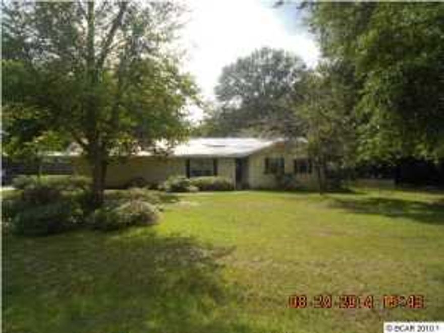 Large 3 bed 2 bath home on 3/4 of an acre. Located in the city limits of Wewahitchka, close to shopping and restaurants. Quite neighborhood. Seller is offering an allowance up to $500 to owner occupant Buyers towards the Buyers purchase of a home warranty of their choice. IN ADDITION to normal Buyer closing costs, Buyer pays Doc Stamps on the Deed, closing service fee of $250, electronic recording fee of $27. If asking for closing cost assistance the maximum considered is 3% of the purchase price for owner occupants with financing. Investor sales are not eligible for buyer closing cost assistance. Closing cost assistance cannot go towards transfer taxes (doc stamps on the deed or mortgage) association transfer fees, or any prepaid expenses. All High Bids will be subject to