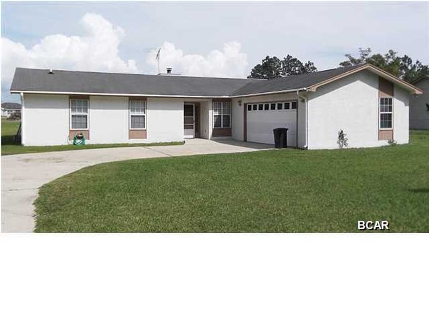 Very  nice home with open floor plan, fireplace, bay window, breakfast bar, separate laundry room, 2-car garage, large rooms throughout, and near Tyndall AFB, and shopping.  Water, sewer and garbage included.