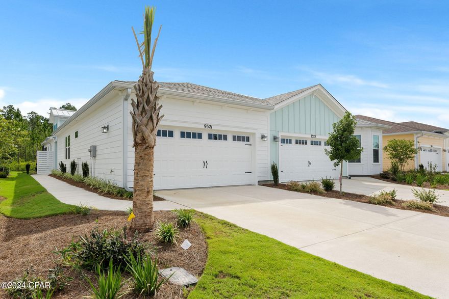 CURRENTLY UNDER CONTRACT, SELLER WILL CONSIDER BACKUP OFFERS' 
Discover the exquisite charm of this brand new, never-lived-in Tortola villa nestled in the sought-after 55+ community of Latitude Margaritaville Watersound. Situated on a tranquil private wooded lot just a short 7-mile drive from the pristine sugar white sands of Panama City Beach's Emerald Coast, this villa offers a serene retreat like no other. Uniquely designed, this villa stands out as the only one in the community to boast 2 En-Suites and a Powder Room, providing unparalleled comfort and luxury. Prepare to be awestruck by the myriad of upgrades throughout the home, detailed in the accompanying documents. Indulge in the elegance of quartz countertops, upgraded cabinets, laminate flooring, and tile adornments gracing every corner. The seamless shower, extended screened-in lanai with cool-decking, pull-down stairs, and attic storage are just a few of the many exceptional features that contribute to the villa's unparalleled allure. This gem of a property is not to be missed. Seize the opportunity to make this villa your own and elevate your living experience to new heights.
Latitude Margaritaville is the most sought after 55+ community in the country right now with unmatched amenities including a private restaurant with 3 bars, resort pool, live music daily, pickleball, bocce ball, cornhole, putting green, Fins Up Fitness Center, indoor lap pool & whirlpool and a full lifestyle staff who dedicate their days to ensuring your fun! Phase 2 of the amenities has broken ground and includes a full size theatre, Barkaritaville dog spa, woodworking shop, business center and community rooms for clubs, groups, tastings and food demonstrations. The public retail has also begun with the golf cart store in full swing, a bank has just broke ground and anticipating the grocery store, restaurants and other boutique shopping soon as well as Public Marina...all through St Joe!