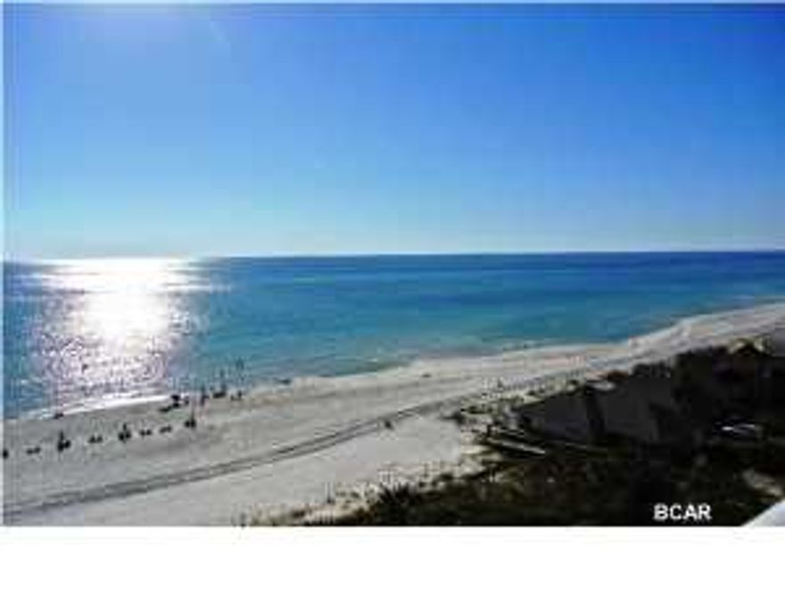 Superstitious?? This beautifully decorated Gulf Front unit with the wow factor view is on the perfect floor--''Lucky # 7'' -- Sterling Beach, one of the newer Panama City Beach condo complexes, has 92 units on 17 floors and was completed in 2003. It is one of the few complexes with a gated entrance and with complete parking on site. The resort amenities include an 8,800 square foot sun deck surrounding a 4000 sq ft heated island pool, a whirlpool spa, a 48 seat movie theater, a gulf front meeting room and gym, two high speed elevators, and an on-site rental management office for those who want assistance generating investment income. The beautiful extensive pavers and gorgeous palms add proof it is a classy resort from the moment you enter the 5 acre property. Furnishings convey with