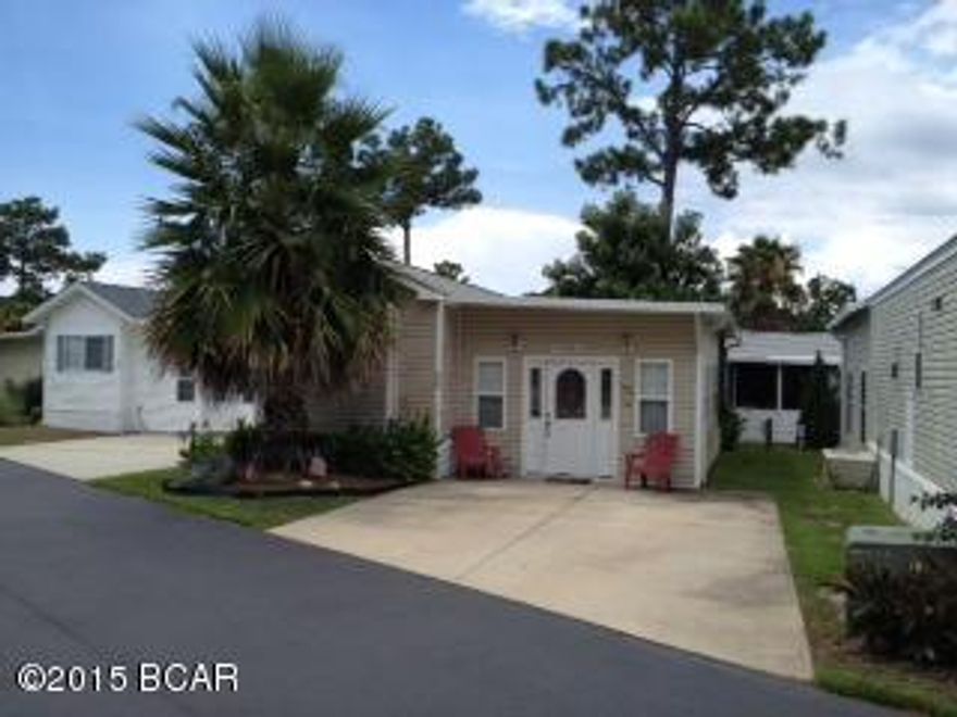 Great park model home in Emerald Point. Emerald Point is a gated community with two pools located just across the street from the Navy Base and just a short drive to the beach. This unit is a 2 bedroom 2 bath unit with a good sized living room and covered porch.