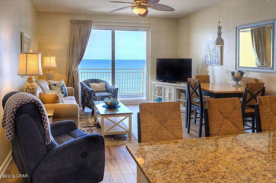 Fantastic opportunity to own this beautiful newly decorated 2nd floor Gulf front condo. Nothing for you to do except move in and enjoy! Great beach and sunset views from the balcony, living room & Gulf front Master bedroom. All new interior decor with porcelain wood-like tile throughout, easy to maintain, no carpet, all new living room furniture, new Master bedroom suite, mattress, box spring & bedding, new dishwasher & refrigerator in 2019, new water heater & garbage disposal in 2018, freshly painted throughout, newly refinished white cabinets in kitchen & bathrooms. 3 owners closets including one inside Master bedroom closet. Located close to County Pier, Shipwreck Island Water Park & Alf Coleman Rd with easy access to Front & Back Bch Rd. Perfect home or Vacation rental. Call today!