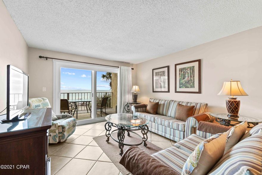 If you are looking for a one of a kind property and the best that Panama City Beach has to offer then look no further! This highly sought after, 2 Bed/2 Bath condo on the 2nd the floor of Regency Towers is gulf front and offers spectacular views of the pool and  Panama City Beach! Enjoy sunrise views in the morning and Sunset views in the evening! The layout of this over-sized condo's interior is superb for entertaining, offering an open floorplan with a good sized dining area and a breakfast bar!! This unit is equipped to sleep 6 with the couch being a sofa sleeper. Conveys fully furnished, turnkey, and rental ready! Regency Towers offers 24 hour gated Security, 2 heated pools, hot tub, kiddie pool, Gulf front gym, Tennis, billiards, and a pool deck eatery and Full Bar!! Beach chair and water sports are right out front with seasonal entertainment! It is located on Thomas Drive within close proximity of Saint Andrews State Park and minutes from the area's finest restaurants, fishing, amusement attractions and golf. All information and measurements are believed to be correct but buyer should verify all information and measurements.