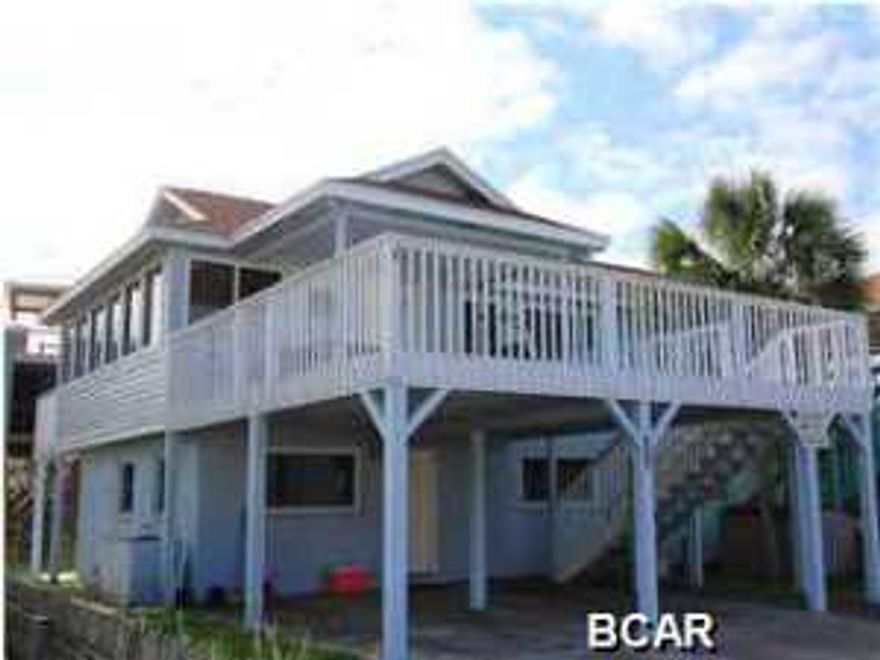 This beachside home is located on a quiet beachside street well off of Hwy 98 and near the pier and canal which can both be viewed from the home. It was remodeled and updated in 2009 and is very good condition. It would make a great beach house that's literally steps from the beach with only 2 homes between it and the beach. There's a big deck for enjoying the views and could potentially be sold furnished.