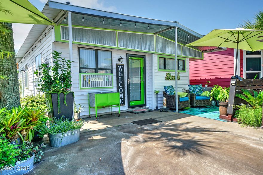 Great opportunity to own in Venture Out! This 2 bedroom 2 bath is simply adorable and in a fantastic location! The living room is spacious, light and airy and the home has a great layout.  Perfect for your second home or investment property! Venture Out offers BOTH beach and bay access! The resort has 2 pools, tennis, golf, shuffleboard, playground, basketball, fishing pier, boat dock with slips & boat ramp. Venture Out is a golf cart community that has exploded in popularity within the last few years. A gated, pet friendly community that's great for full time residency or just to vacation. 24 hour security & friendly atmosphere