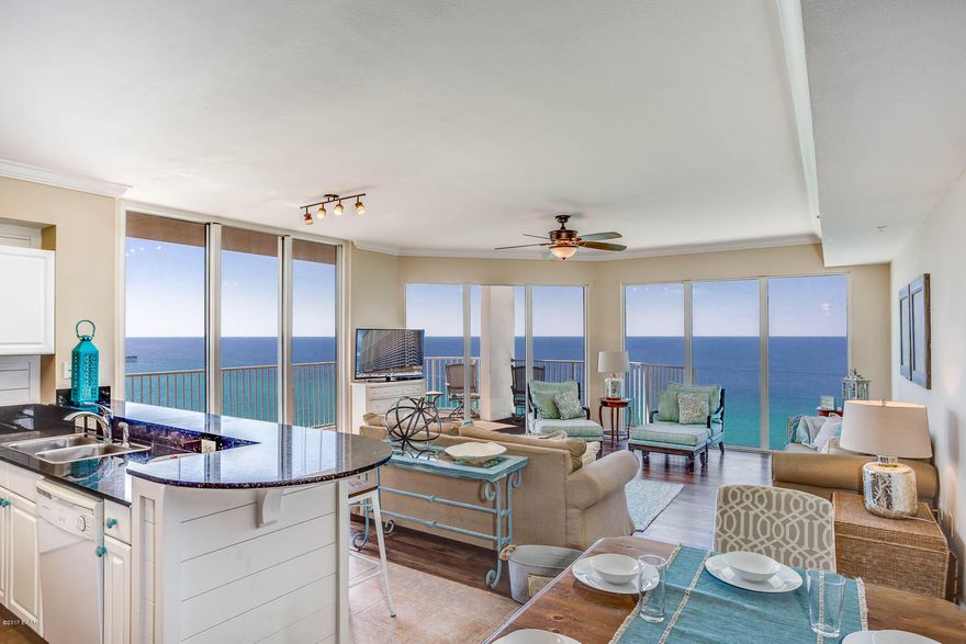 Welcome to Tidewater 1317! A gorgeous three bedroom, three bathroom east corner condo at Tidewater Beach Resort in Panama City Beach, Florida. This condo has an unbelievable rental history with over $90,000 in gross rental income produced in 2015 and also 2016 by the owner. The open living/kitchen/dining area highlighted with expansive wraparound windows and accented with beautiful coastal decor make this condo a wonderful turn-key investment for any buyer in the market. Whether searching for a vacation rental investment, second home, or weekend escape this property affords incredible views in a perfect setting.