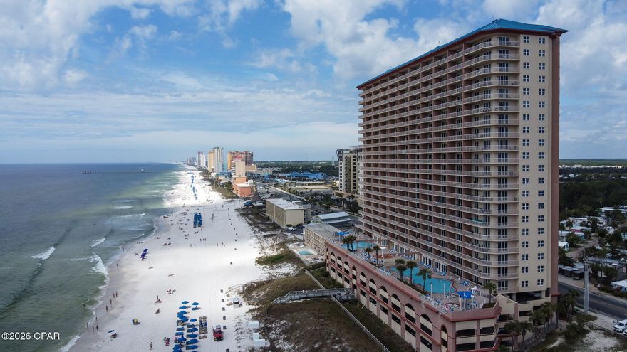 Gulf-Front Corner Unit Near Pier Park | 6th Floor Overlooking the Pool

This 3-bedroom, 3-bath corner condo at Sunrise Beach Resort offers a more open and expansive beach view thanks to its corner location and 6th-floor position directly above the resort pool. With 1,568 sq ft of Gulf-front living, this unit is just minutes from Pier Park and stands out for its sightlines, layout, and proximity to amenities.

The corner layout provides additional windows, increased natural light, and a wider view of the Gulf, along with a spacious wrap-around balcony ideal for relaxing or entertaining. Inside, the open floor plan includes tile flooring in the bedrooms, 9-foot ceilings, crown molding, plantation shutters, and a kitchen with granite countertops and a large breakfast bar. The condo is fully furnished and rental-ready.

The primary bedroom features Gulf views, balcony access, a walk-in closet, double vanities, a jetted garden tub, and a separate shower. Both guest bedrooms also offer Gulf views—an uncommon and highly desirable feature.

Sunrise Beach Resort amenities include two Gulf-front pools (one heated seasonally), hot tubs, a fitness center, an owner's lounge, a theater room, a splash fountain, and direct beach access. Located on Front Beach Road near Pier Park, this property combines strong views, a practical layout, and a highly convenient location.