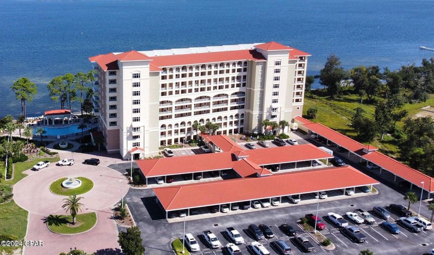 UNDER CONTRACT TAKING BACK UPS WITH 72 HOUR KICKOUT CLAUSE This Magnolia Bay Condo shows beautifully. Recently updated, it is move in ready condition. Large floor plans are perfect for year round living or large family extended stays. Three full bathrooms with the third bedroom being used as a crafts room, would make a great office or flex space. Overlooking St. Andrew's Bay, the port, bridge, and Navy base there is always something to watch. These prized fourth floor units offer additional privacy. The gated complex has a pool, bay front exercise room, community lounge, dock, and covered assigned parking. There is also a storage room and the patio furniture is included No short term rentals are allowed providing a serene atmosphere.