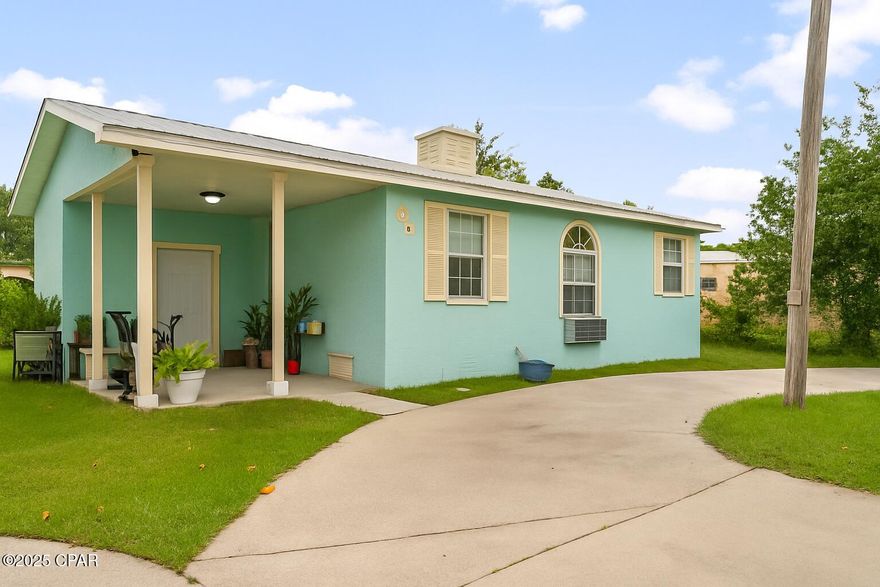 Charming Florida cottage conveniently located near Tyndall Air Force Base! This home offers two spacious bedrooms and a comfortable living room with carpet. The galley-style kitchen provides plenty of cabinet space and a breakfast bar. A covered patio located at the side entry near the front door provides a welcoming spot to relax, nurture plants, or enjoy a small garden. An enclosed closet area offers additional storage and a washroom with washer/dryer connections.

For outdoor enjoyment, you'll find Under the Oaks Park just a short drive away, perfect for picnics under the shade of beautiful oak trees. Water enthusiasts will appreciate nearby public boat ramps within a short distance such as Earl Gilbert Park and Parker City Pier, offering easy access to the bay for fishing, and boating.
This property is a wonderful opportunity to enjoy simple Florida living in a convenient location.