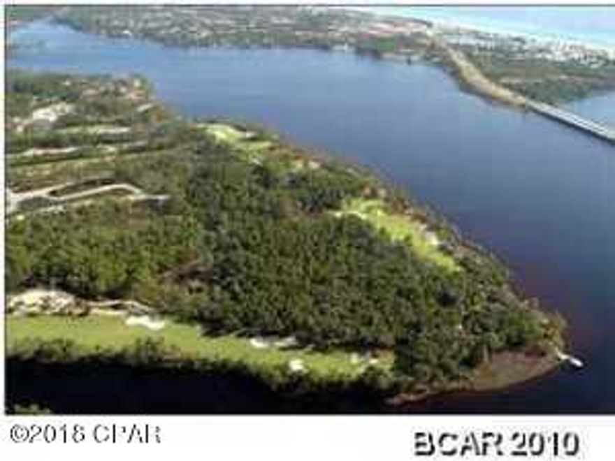 For Comp purposes only. This beautiful lot is located in the gated community of Wild Heron. Wild Heron is a gated community located at the border of Northwest Florida's Walton and Bay Counties. Wild Heron sits directly on Lake Powell, one of the region's largest coastal dune lakes. Coastal dune lakes exist as a natural estuary transition between the Gulf of Mexico and inland areas. Amenities include Shark's Tooth Golf Club, Har-Tru Hydrocourt Tennis Courts, a lakeside grill and fire pit, community swimming pool, fitness center, boardwalks, trails and parks. The Boathouse at Prospect Point includes a dock for access to Lake Powell and is well stocked with kayaks and canoes for residents' u