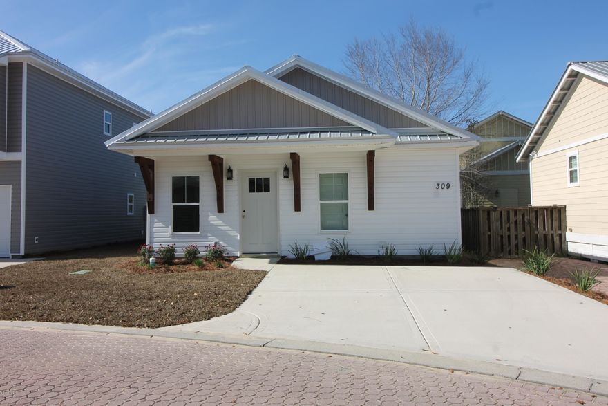 Stunning new construction, close to Tyndall AFB and perfect for that small family or couple looking to down size. All homes will be built with similar finishes, custom cabinets, new vinyl plank wood looking floors, new carpet in bed rooms, tile in bathrooms, Neighborhood offers paver streets and driveways & Park areas. These homes are energy efficient and will save you on your utility bills. These homes have metal roofs and low low energy bills. They are perfect for first time home buyer or for an investor looking for cash flow... These will. Come by and see our model home today