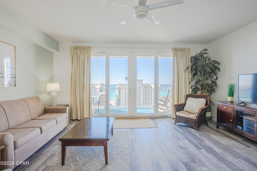 Welcome to Unit 1116 at Laketown Wharf, where resort-style living meets incredible views and endless amenities! Located on the prime 11th floor, this beautifully laid-out condo offers 1,047 square feet of open and spacious living, designed for comfort and relaxation. Step out onto the large private balcony and take in stunning views of the Gulf, perfect for morning coffee or evening sunsets.

The open layout of the kitchen & living area is perfect for entertaining! It is bright and airy with tons of natural light pouring in from the large sliding doors to the Gulf-facing balcony. You will find tile & LVP flooring throughout the unit. No carpet = easy upkeep! The condo includes a private master en-suite and a versatile bunk room with its own bathroom. It can sleep 6 guests comfortably. This condo is perfect for a primary residence or short term rental.

Laketown Wharf is known for its impressive resort amenities, including five unique swimming pools, a state-of-the-art fitness center, a poolside bar, waterfront dining, and a nightly fountain light show that creates a fun and lively atmosphere. Guests also enjoy gated beach access for easy trips to the sugar-white sand and emerald waters.

The location is hard to beat, directly across the street from the famous Pineapple Willy's and convenient to shopping, dining, and entertainment. The commercial level under the building features restaurants, shops, and a bowling alley, making it easy to enjoy everything Panama City Beach has to offer without ever leaving the property.

Whether you are searching for a vacation getaway or a strong short-term rental investment, this darling condo offers stunning views, excellent amenities, and a prime beachside location. Come see it today!