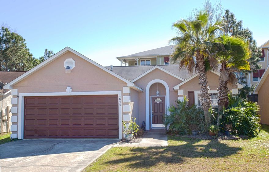 This updated home is a must see. Seller's have put a lot of upgrades and personal touches into this Beautiful 2BR/2BA home. You will enjoy the large living room with sliding doors that lead out to a covered patio and fenced in back yard. The kitchen has stainless steel appliances, granite counter top and all new cabinets. In the master bedroom you also have a sliding glass door that goes out to the covered patio area, and the master bath features a custom rain shower and a spacious double sink vanity. Age, Square Footage, and room sizes approx., if important please verify.