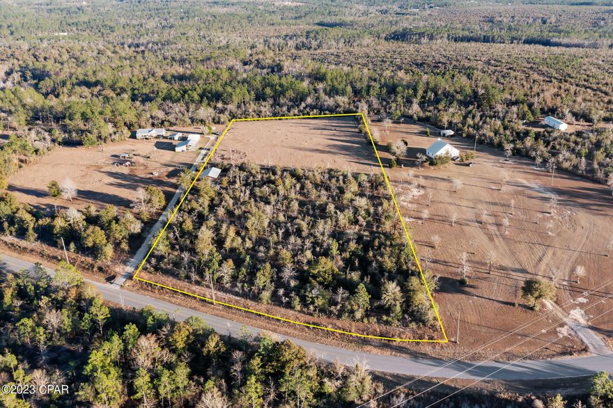 Looking for some privacy? This partially wooded/cleared 5.69+/- acre parcel would make the perfect place for your dream home or mobile home. Property is located atop of Orange Hill offering stunning views and just a short drive to town.