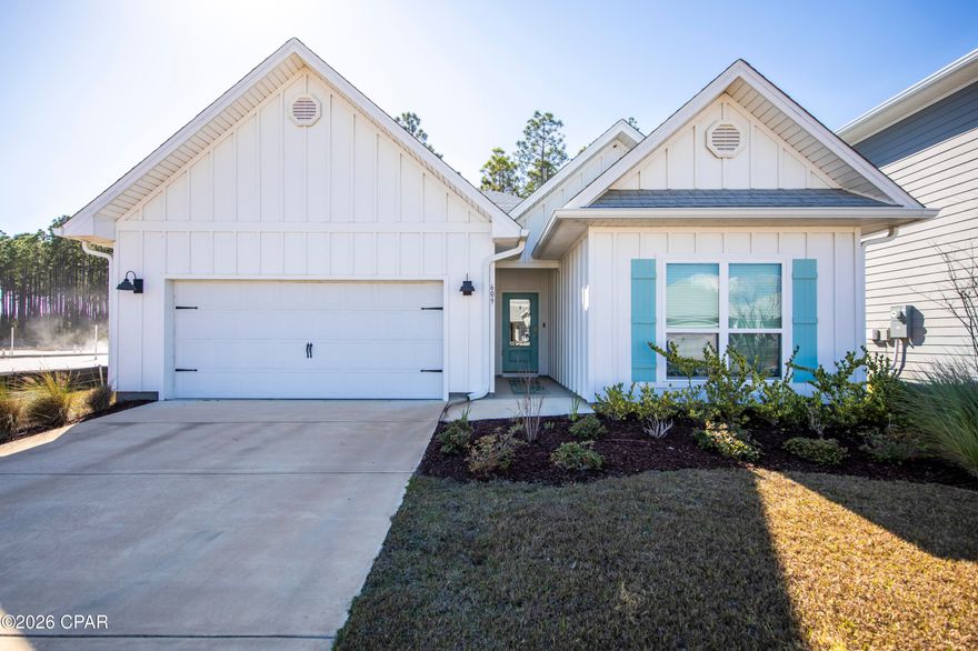 Welcome to **Ward Creek**, where newer construction meets everyday convenience and a splash of coastal charm. This beautifully maintained **5 bedroom, 3 bathroom home is just 2 years young and offers the perfect blend of space, style, and location.

Seller is offering 2/1 buydown with full price offer. 

Step inside to discover a thoughtfully designed floor plan ideal for both lively gatherings and quiet evenings in. With five true bedrooms, there's room for everyone to spread out, create a home office, or host guests with ease. All vynal plank and NO CARPET.  The open living areas flow effortlessly, creating a warm and connected heart of the home.

Practical features shine here. The spacious 2-car garage includes built-in shelving for additional storage, and you'll appreciate the approximately **100 sq ft of attic storage space**, giving you even more room to stay organized without sacrificing living space.

Out back, enjoy rare privacy as the property backs up to **wooded wetlands**, offering a peaceful natural backdrop where no one can build behind you. The fenced backyard is perfect for pets, play, or relaxing evenings outdoors. A sprinkler system keeps the lawn lush, while the landscaped front yard enhances the home's curb appeal.

Location is the golden key. You're minutes from the Tallahassee Memorial HealthCare Center, approximately 15 minutes to Northwest Florida Beaches International Airport, 10 minutes to the shopping, dining, and entertainment at Pier Park, and just 15 minutes to the white sandy beaches of Panama City Beach.

Ward Creek residents enjoy a neighborhood pool, park, and direct access to a walking and biking trail, making it easy to embrace the Florida lifestyle right outside your door.

Nearly new. Private backdrop. Exceptional storage. Prime location. Ready to welcome you home.