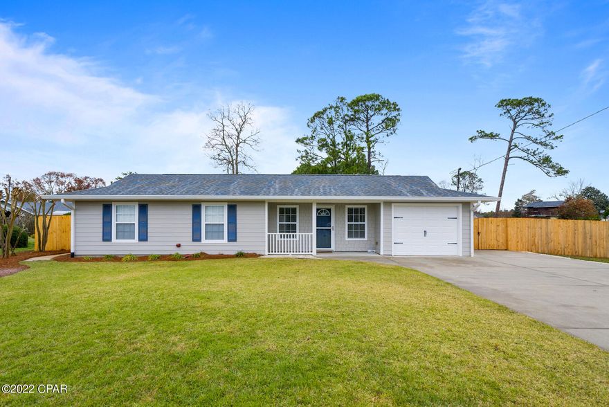 This adorable 3b/2ba ranch style home has been newly rennovated. New wood style flooring, fresh paint inside and out, and a new roof. This home has a HUGE backyard and tons of parking! It also features a wrap around screened in porch. Great for entertaining. The driveway will hold 6 cars.  There is also a one car garage and a gravel parking area in the park yard. Owner does allow trailers, rvs and/ or boats to be parked here. Dogs allowed with owner approval.

Lawn care and pest control are included.