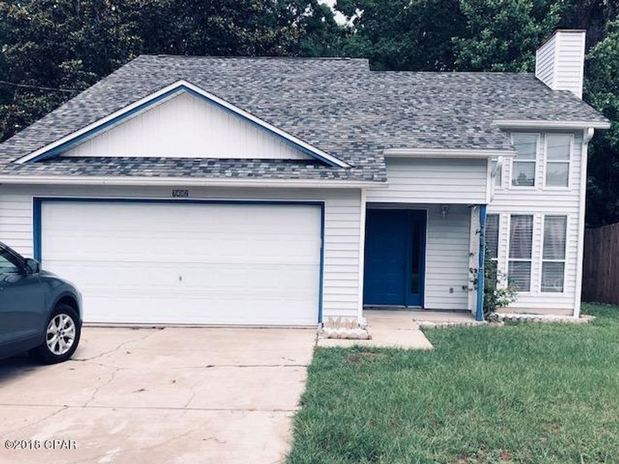 COME HOME to this FRIENDLY TYNDALL area neighborhood! You'll enjoy the convenience to work,schools and shopping. The exterior is low maintenance siding  and a new roof has recently been added. The interior has a dramatic 2 story ceiling and features a wall of windows, creating a light and bright interior. An OPEN CONCEPT plan offers a dining space and kitchen just off the living area. Glass doors open up to a cozy deck overlooking a wooded back yard. It offers the perfect spot for morning coffee! The Master Suite is tucked into a quiet space on the first floor, and the master bath features double sinks. Upstairs includes 2 large guestrooms and a full bath. This freshly painted home is move in ready and will be the perfect home to add your special touche