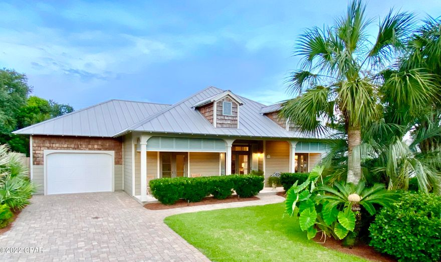 CURRENTLY UNDER CONTRACT, SELLER ACCEPTING BACKUP OFFERS

Exquisite custom home in Santa Monica Beach (West of Panama City Beach), the coveted West End community with no thru traffic and a Private Gated Beach Entrance & $120/annual HOA.  With no detail overlooked, the Chef's Kitchen features Viking Professional Appliances, Granite Tops, Walk-in Pantry, plentiful Custom Cabinetry, and Reverse Osmosis water. The screened porch, with wood burning Fireplace, overlooks the Private Saltwater Pool.  The living room, with soaring 17' vaulted ceilings and gas fireplace, offers views to the back yard oasis with mature, low maintenance landscaping.  An attached Cabana, overlooking the pool, can be used as a bunk room, spa room, studio, or office.  The primary bedroom with ensuite bath opens to screened porch.  Primary bath features include a custom dual vanity with Carrera Marble top, Walk-in shower, and plumbing for bidet reinstallation, if so desired. 10' Ceilings throughout and 17' pine with cedar beam vaulted living room ceiling.  All bedrooms and living areas have french doors that open to covered patios. Solid core 8' interior doors; James Hardie siding; hurricane rated Andersen Windows & Door; tankless Rinnai water heater, for endless hot water, and an attached garage. Driveway, walkways, pool deck, & backyard are constructed of pavers. Next to the Pool is a private Outdoor Shower and room for extra storage. For added convenience there is a huge underground Propane Tank, with grill connection, comprehensive Irrigation System, and Security System...
140 Belaire is a custom residential project built by Anderson Construction, top quality Master Builder.