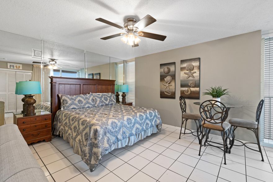 CURRENTLY UNDER CONTRACT.  SELLER IS ACCEPTING BACK UP OFFERS.  Beautiful view of the Gulf from the balcony of this end efficiency unit.  Also includes a king sized bed, pull out sofa, washer/dryer, ceiling fan, refrigerator, microwave, cook top and TV.  All sizes are approximate measurements.