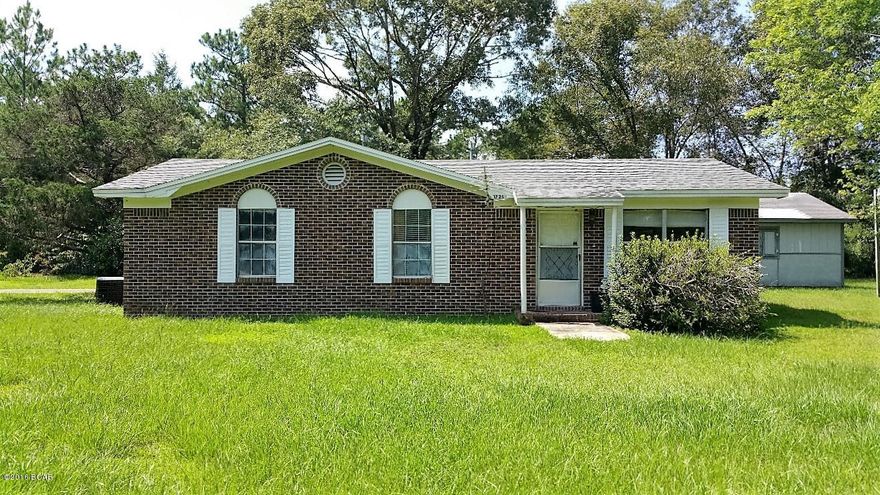 Nice brick home near Ponce de Leon, Florida with 200 feet of paved road frontage on Highway 90.  3-bedroom, 1-1/2 baths and ready-to-move-into condition.  Comes with stove, washer and dryer.  Has textured ceilings and newer carpet and AC unit.  Large concrete patio behind home leading to the 24X24 2-car garage with a lot of storage room.  Also on the property is a 12X32 metal building with electricity that was once used as an apartment. Close to Interstate 10, Vortex Springs, and Ponce de Leon Springs. Schools are Ponce de Leon Elementary and Ponce de Leon High School.  Less than an hour to Panama City Beaches or Beaches of South Walton !!