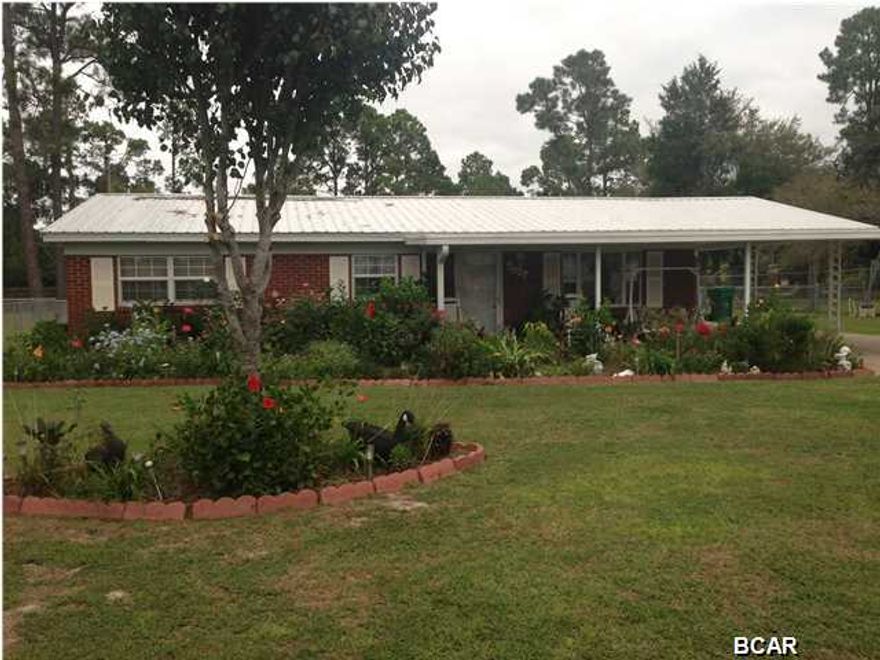 WELL KEPT HOME ON LARGE LOT FOR ONLY 129,999. THE YARD IS PERFECTLY KEPT AND HAS A HUGE COVERED PATIO FOR OUTSIDE ENTERTAINING. THE KITCHEN HAS BEEN REMODELED AND HAS A BEAUTIFUL ISLAND. THE 2ND BATHROOM HAS A JACUZZI TUB AND PLENTY OF ROOM FOR STORAGE. THE MASTER BEDROOM HAS A VERY LARGE WALK IN SHOWER. BRAND NEW ROOF AND A/C UNIT. HOME IS COMPLETELY MOVE IN READY. PLEASE CALL FOR YOUR PRIVATE SHOWING TODAY. ALL SIZES APPROX. SQ FT.& LOT SIZE TAKEN FROM BAY COUNTY TAX RECORDS.