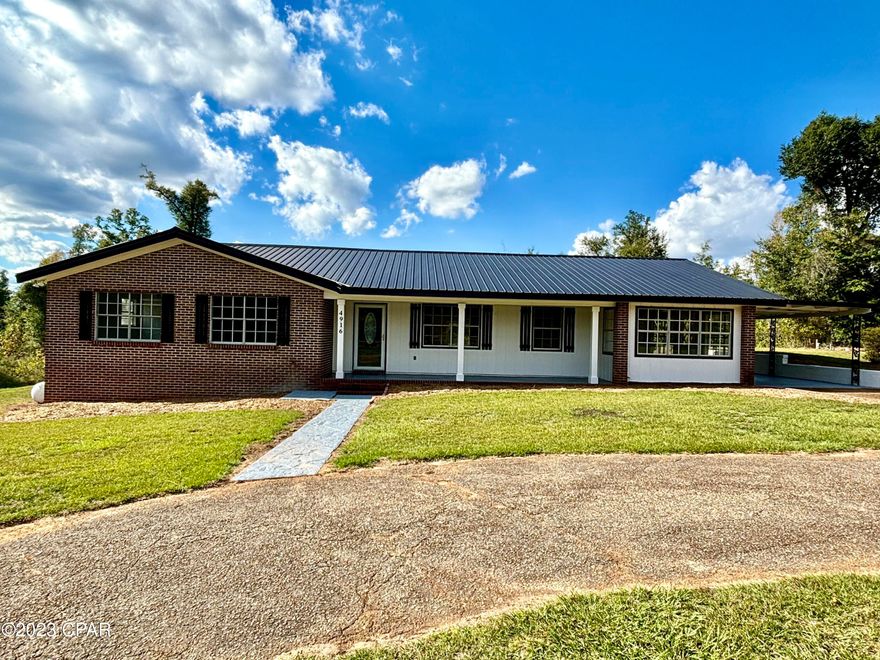 Welcome to the Neighborhood! Don't miss this beautifully remodeled 4 bedroom/ 3 full bathroom home sitting on 2.7 acres in the heart of Dogwood Heights in Marianna, FL. This property has so much to offer! Upon entering the home you are welcomed by a large open living area complete with a new fully custom kitchen that boasts brand new stainless appliances along with granite countertops. The large living area features a fireplace and new fixtures throughout. Off to the back of the living area is a large second living area perfect for extra space! Off to the right of the living area features a large office with custom built in cabinets, an oversized laundry room that could double as a pantry, and the master bedroom that features a stunning master bathroom complete with his and her walk in closets, a large tub, separate shower, and a double vanity sink. To the left of the living area sits the other three large bedrooms and 2 full bathrooms. On the back of the home you are met by a large screened in porch! This property also has a large garage/ shed, carport, firepit area, oversized front yard, and circle drive. Schedule a showing today before it's gone!