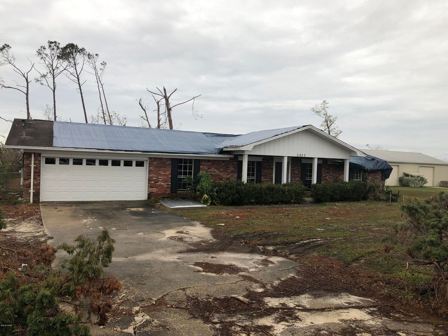 THIS 3 BED 2 BATH  BRICK HOME SUFFERED HURRICANE DAMAGE BUT IS BELIEVED TO BE FIXABLE. THIS PROPERTY ALSO HAS A POOL & 2 CAR GARAGE. FOR A MINIMAL INVESTMENT THIS WILL MAKE SOMEONE A GREAT HOME OR INVESTMENT PROPERTY. MAKE AN APPOINTMENT TO SEE THIS ONE TODAY.