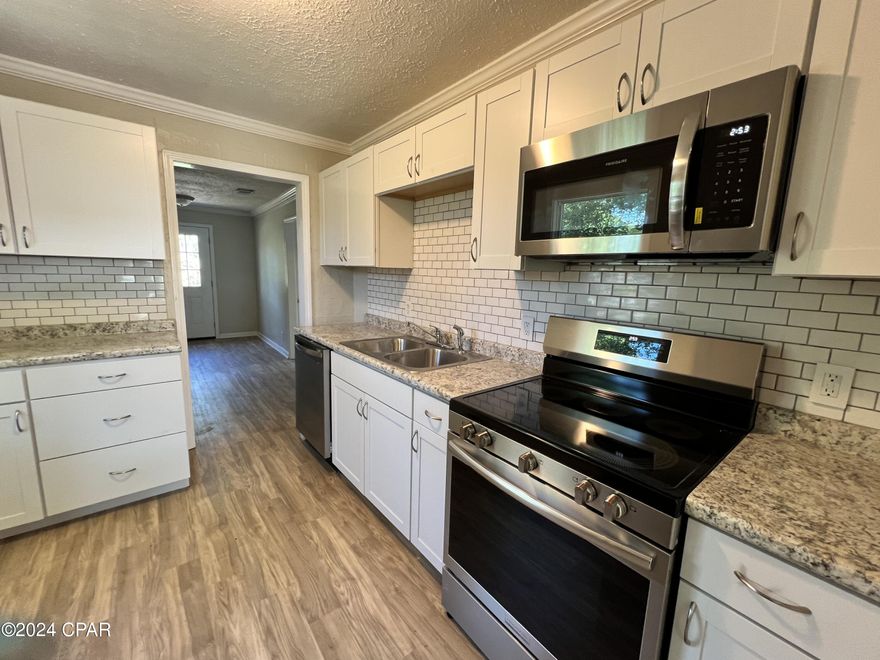 'CURRENTLY UNDER CONTRACT, SELLER WILLING TO CONSIDER BACK UP OFFERS.' Great home for a first-time homebuyer or investor! This three-bedroom, two-bath house is tucked in a low-density neighborhood off 15th St in Panama City. This property has been completely remodeled. Newer roof, new flooring, windows, doors, paint, stainless kitchen appliances, and bathroom vanities. The property appraiser's website has an incorrect square footage and number of bedrooms/bathrooms. Dimensions approximate, please verify if important.