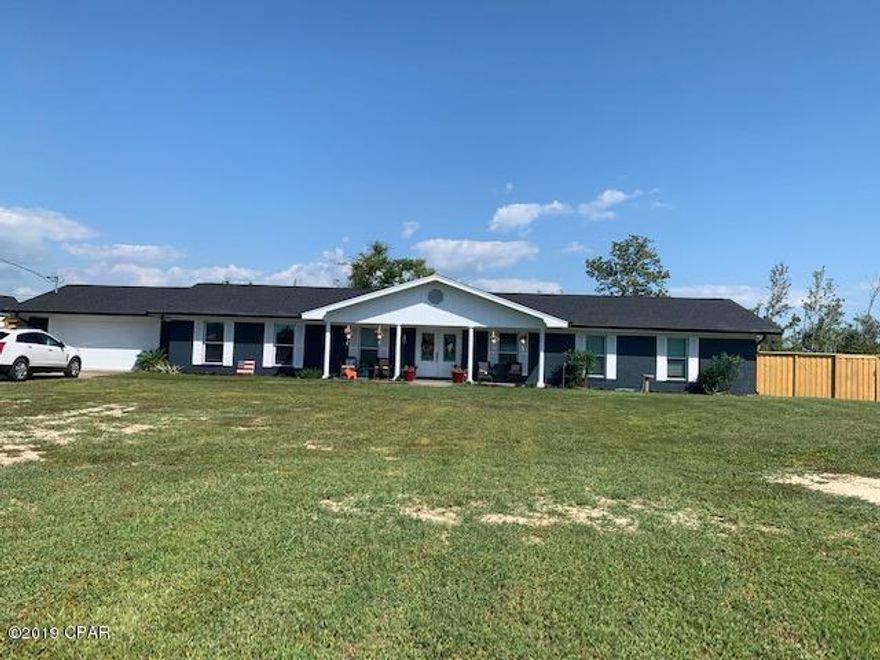 Enjoy it all in this beautifully renovated home on 1 acre with a pool, hot tub, huge yard and wonderful outdoor kitchen in the prestigious College Point neighborhood.  Step inside and marvel at vintage charm meeting modern decor while retaining that feel of being right at home.   The chef in the family will appreciate the brand new kitchen that includes a wine fridge, top of the line appliances, quartz counters and new cabinets.  Easily entertain friends with the bar in the living room and open living area.  The versatile floorplan could easily accommodate a mother-in-law quarters on one end with a private entrance.  A Florida room overlooks the sparkling pool with lush landscaping.  A truly delightful home with lots of extras.  Furniture/decor & all can also be purchased for an extra 15K